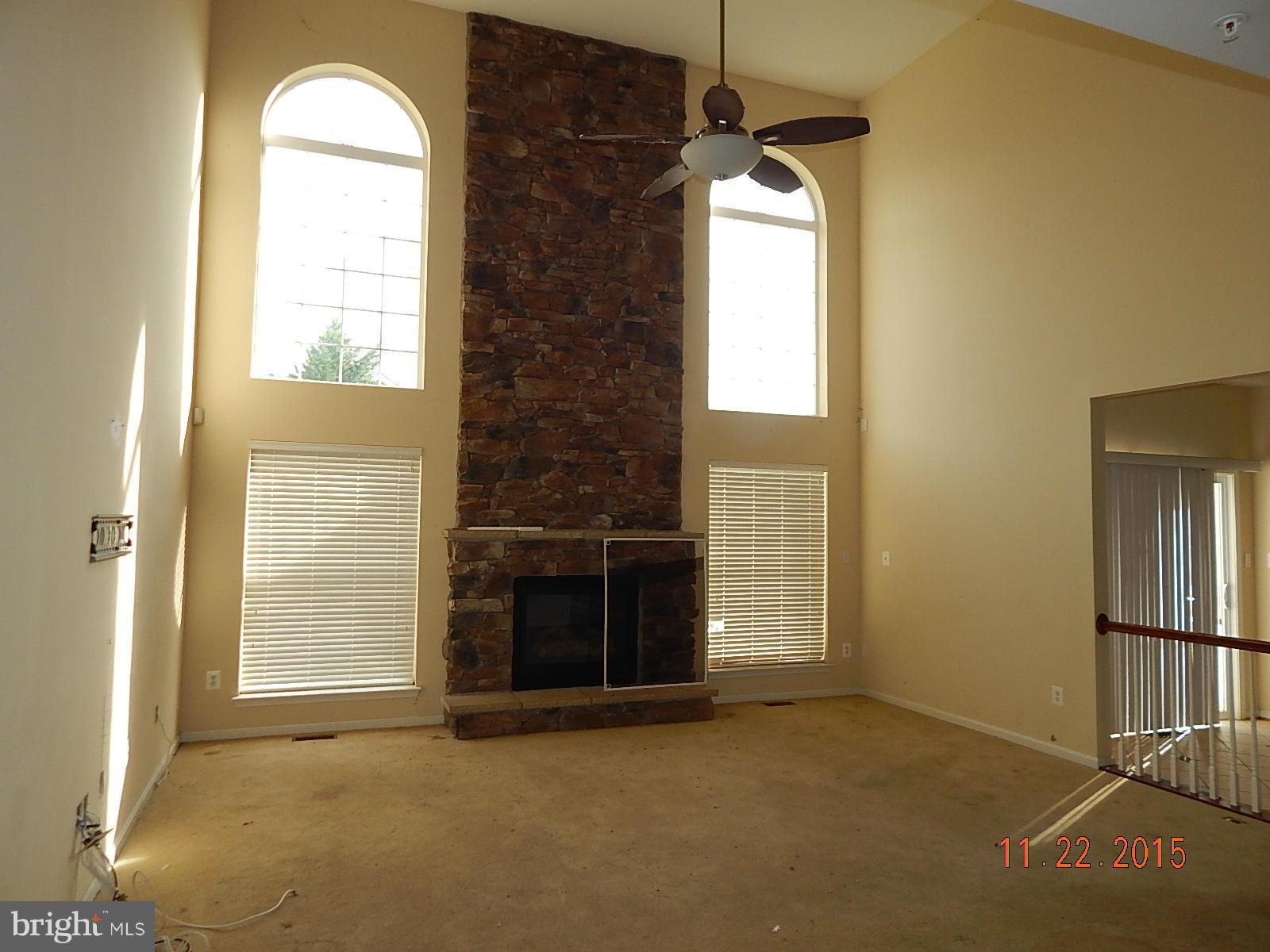 14411 Autumn Rust Road Boyds, MD 20841 - Photo 10 of 30 an empty room with windows and fireplace