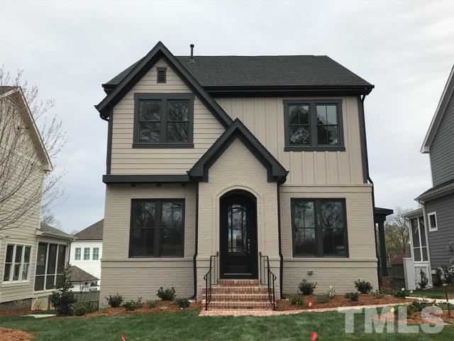 602 Virginia Avenue Raleigh, NC 27604 - Photo 1 of 1 a view of a house with brick walls and a yard