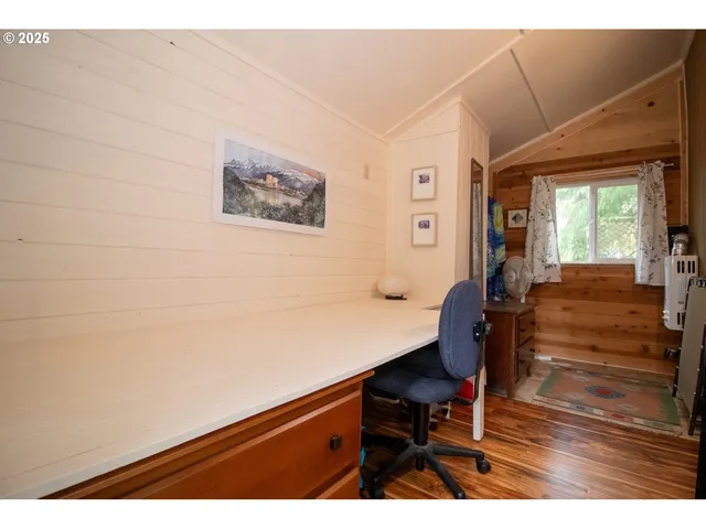 a view of a workspace with furniture