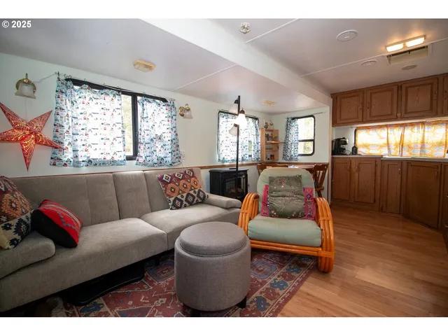 a living room with furniture and window