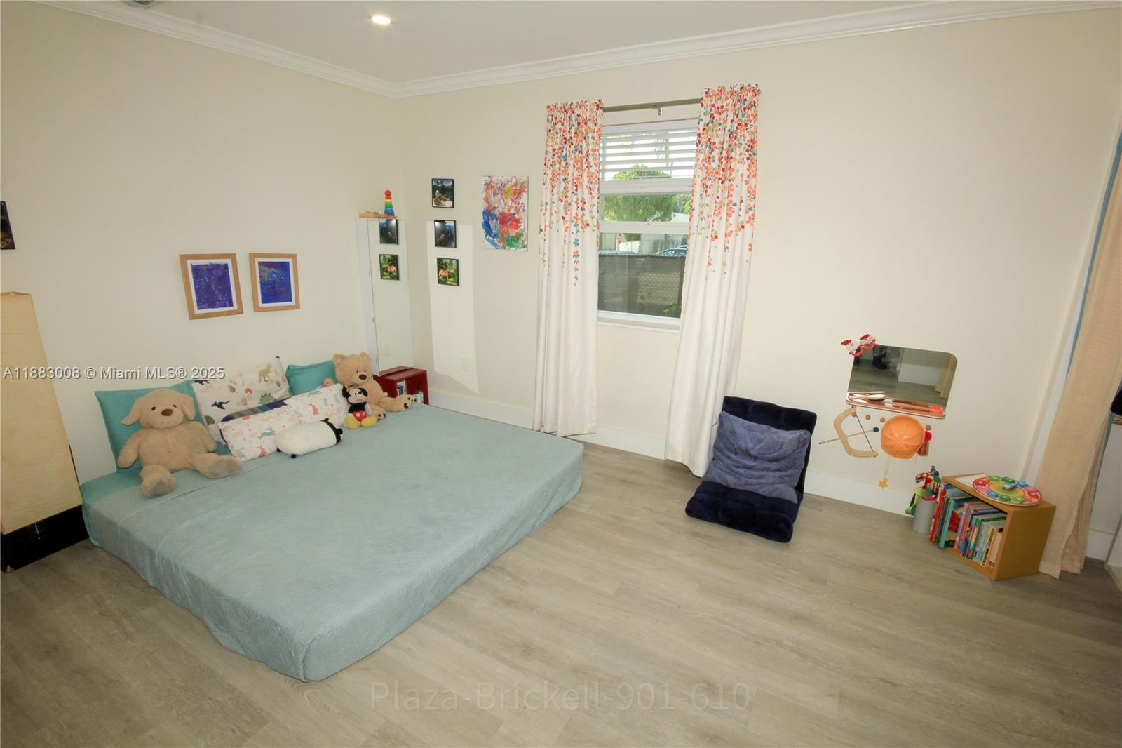 2754 Southwest 36th Avenue Miami, FL 33133 - Photo 16 of 35 Flexible Indoor SpaceThis versatile indoor area is filled with natural light and offers an open layout, making it ideal for a bedroom, playroom, or creative studio, allowing for flexible use and arrangement.
