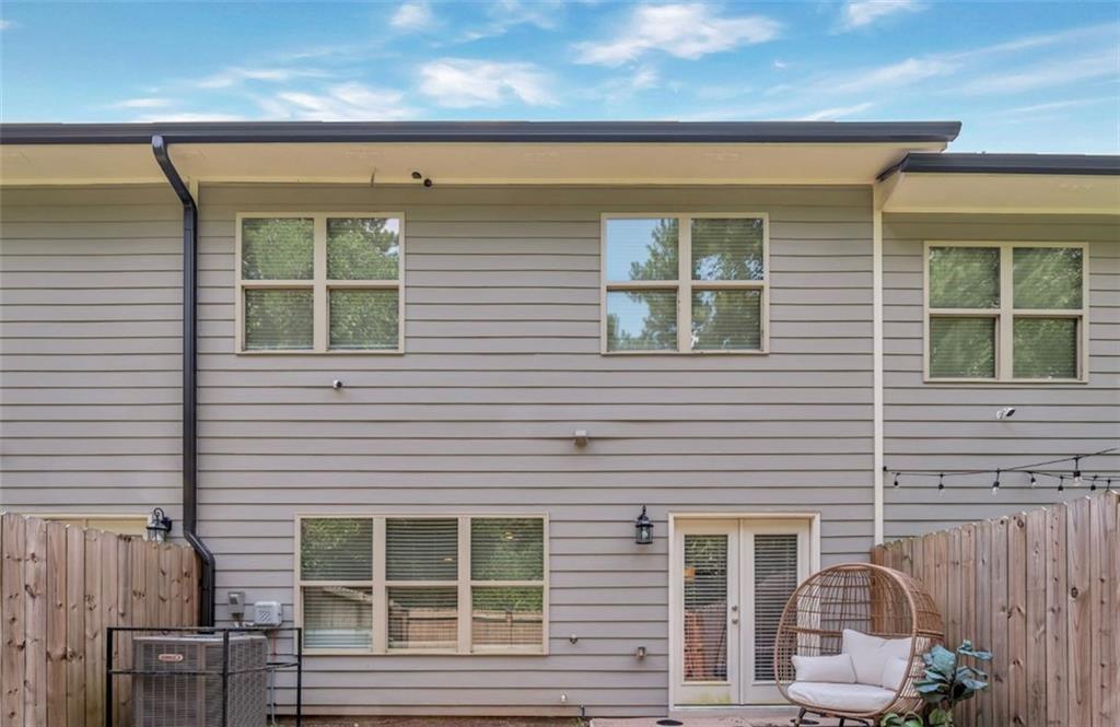 378 Mulberry Row Atlanta, GA 30354 - Photo 12 of 12 a front view of a house with large windows