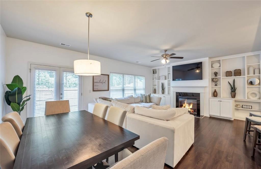 378 Mulberry Row Atlanta, GA 30354 - Photo 2 of 12 a living room with fireplace furniture and a wooden floor