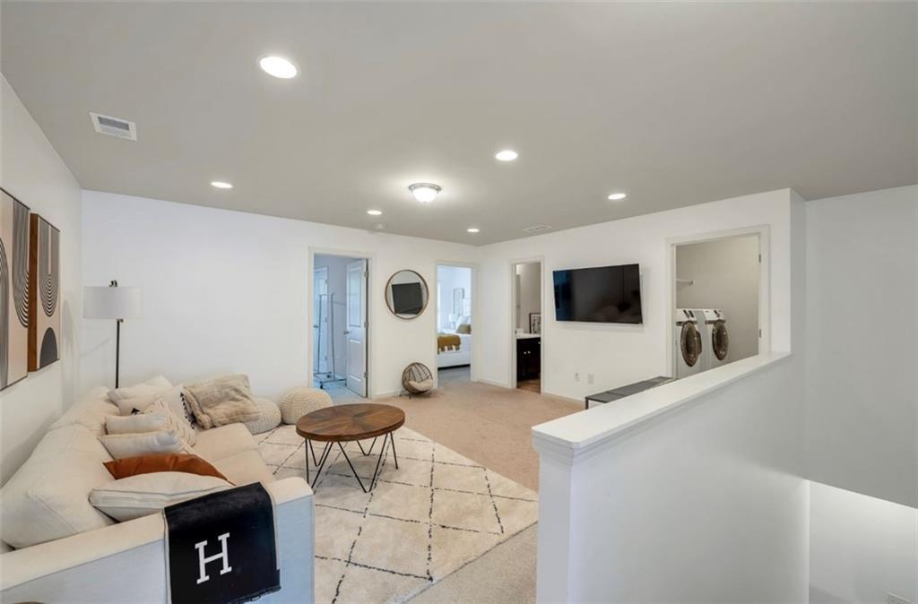 378 Mulberry Row Atlanta, GA 30354 - Photo 7 of 12 a living room with furniture and a flat screen tv