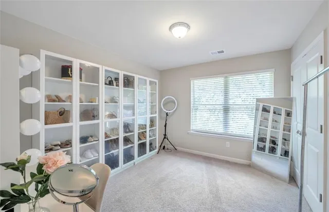 a view of livingroom with furniture and windows