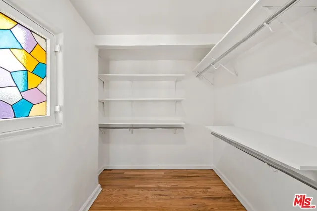 a view of an empty walk in closet