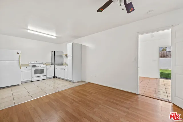 a view of a kitchen with a sink