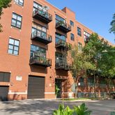 a front view of a building and a street view