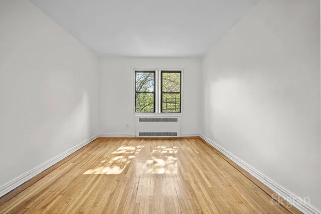 a view of an empty room and window