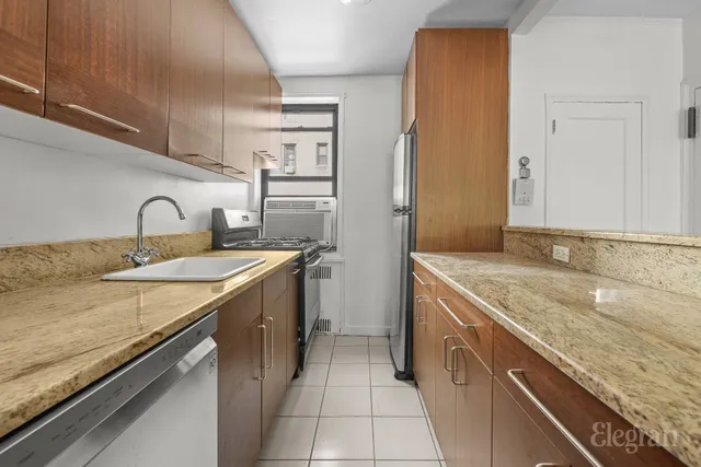 a view of a kitchen with a sink