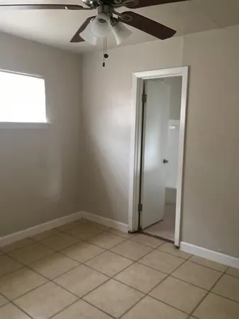 a bathroom with a toilet a sink and bathtub