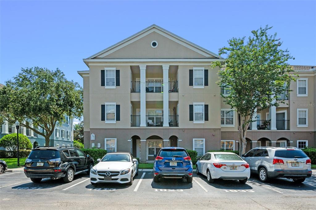 3701 Conroy Road, Unit 1812 Orlando, FL 32839 - Photo 2 of 37 a car parked in front of a house