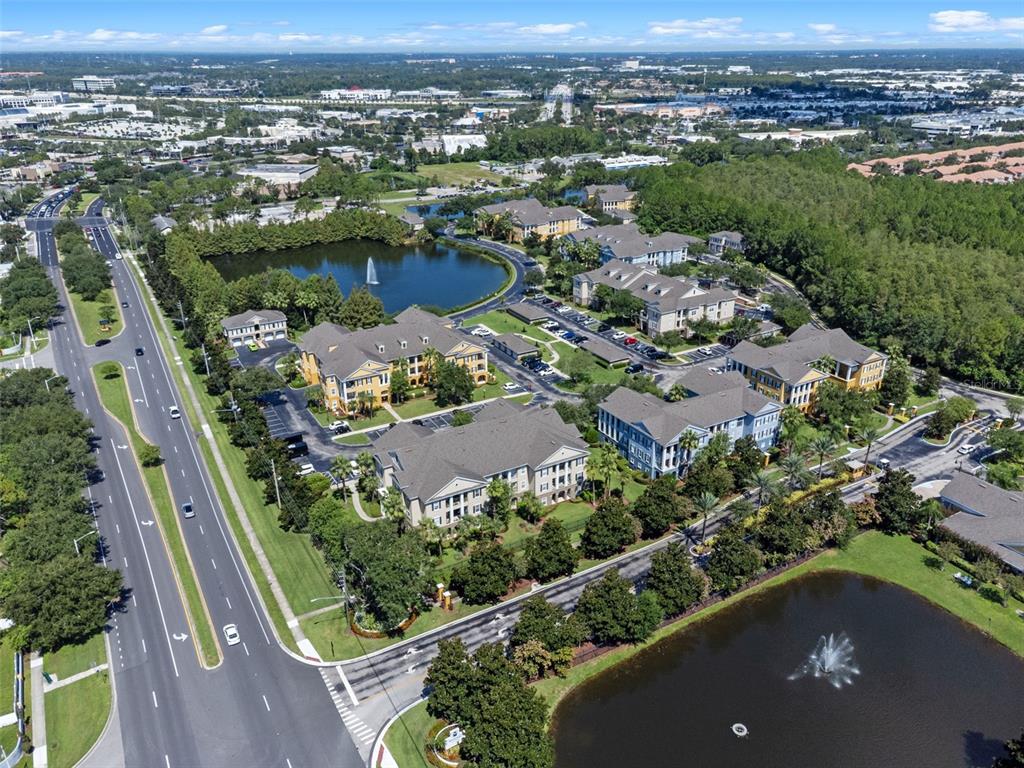 3701 Conroy Road, Unit 1812 Orlando, FL 32839 - Photo 34 of 37 an aerial view of a house with a garden
