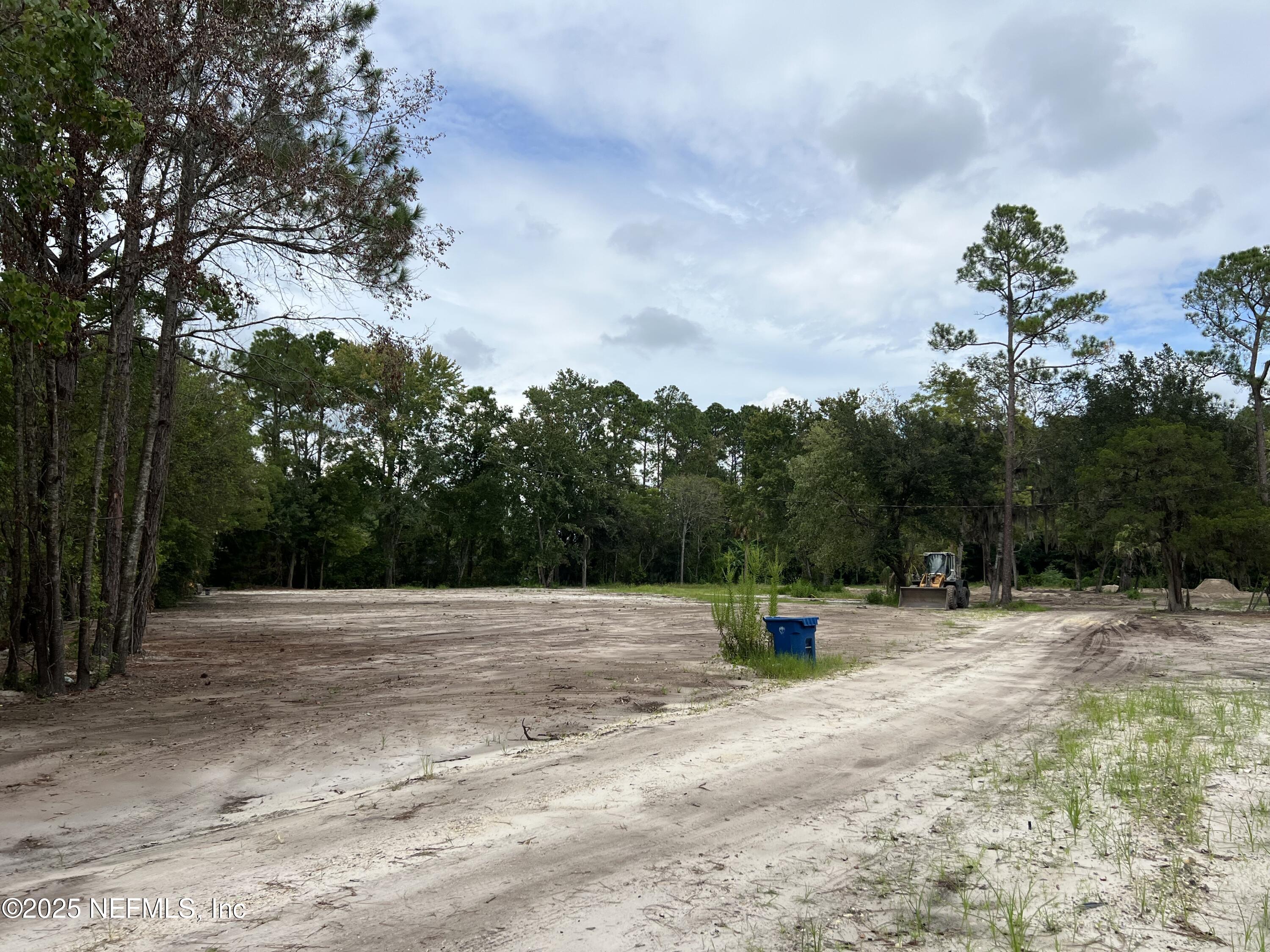 921 Cole Road Jacksonville, FL 32218 - Photo 11 of 21 a park view with a fountain and large trees