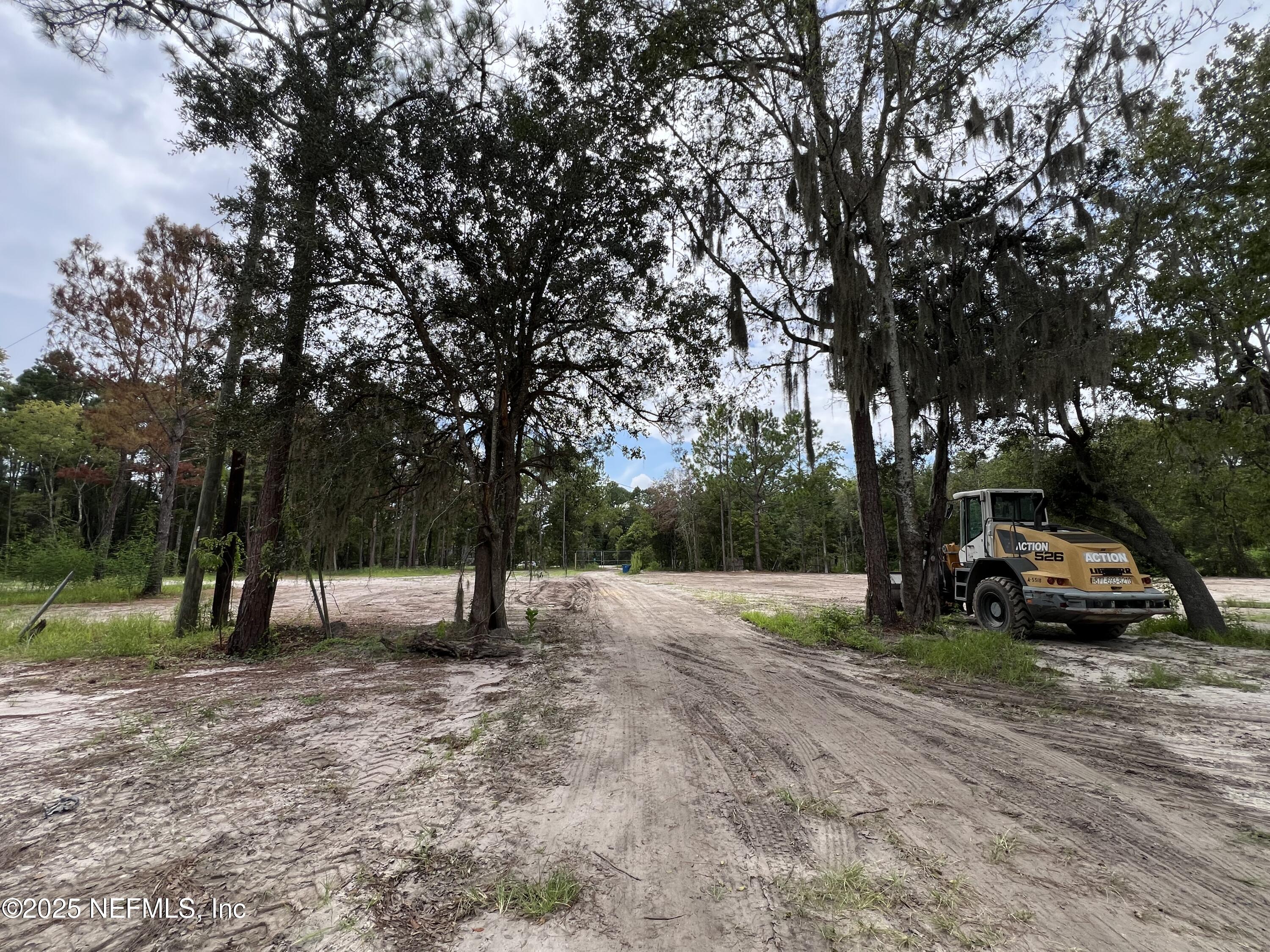 921 Cole Road Jacksonville, FL 32218 - Photo 19 of 21 a view of street with parked cars