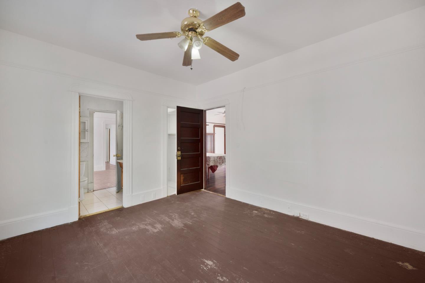 674 South 5th Street San Jose, CA 95112 - Photo 11 of 32 an empty room with closet and windows