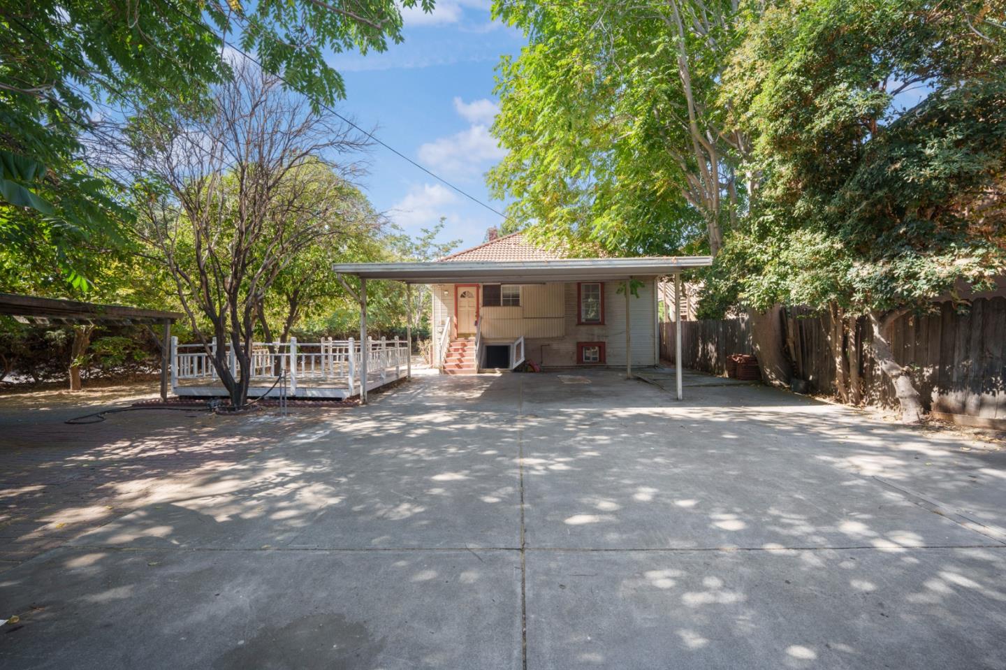 674 South 5th Street San Jose, CA 95112 - Photo 22 of 32 a view of a house with a backyard