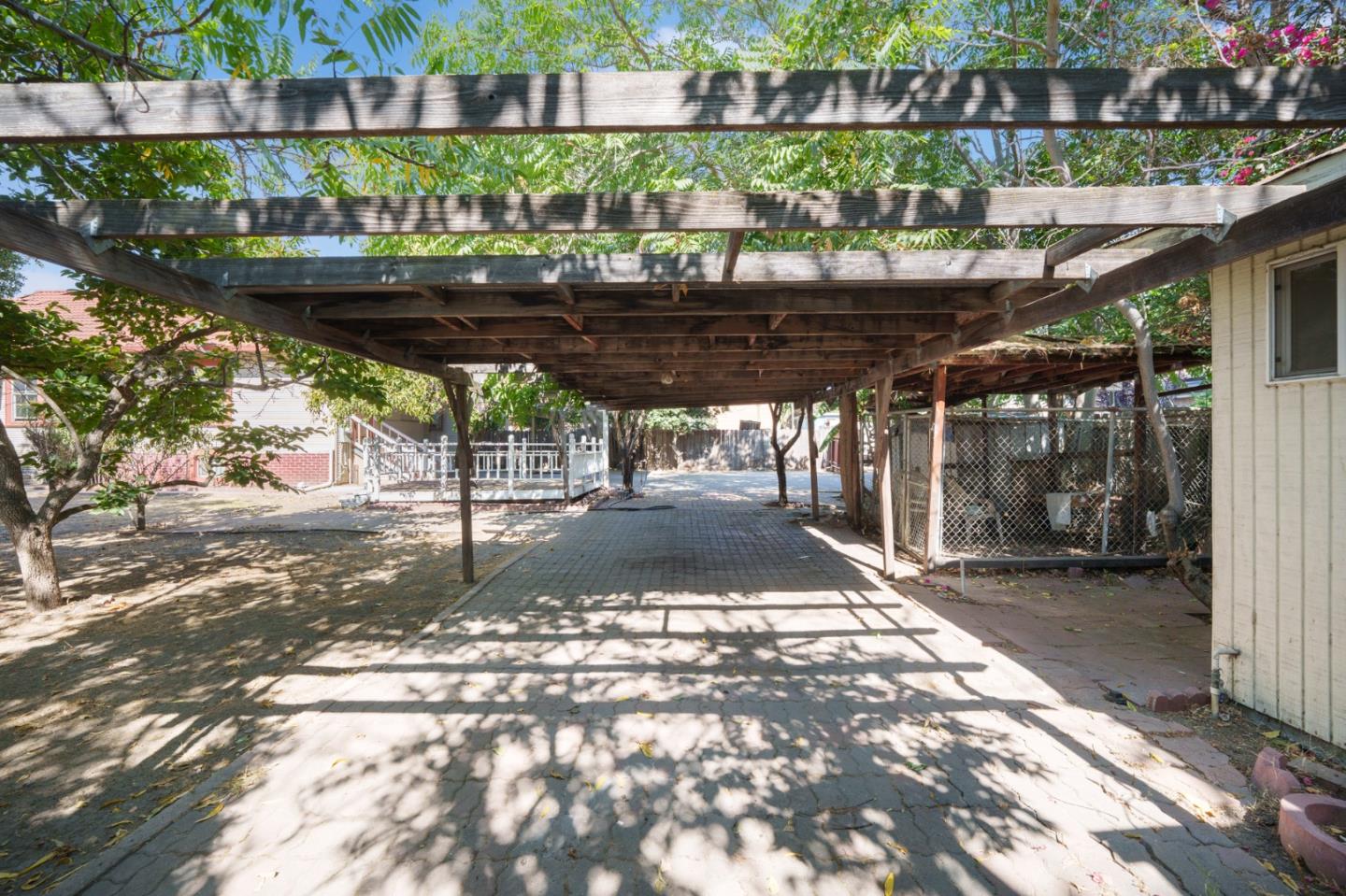 674 South 5th Street San Jose, CA 95112 - Photo 26 of 32 a view of a patio with table and chairs