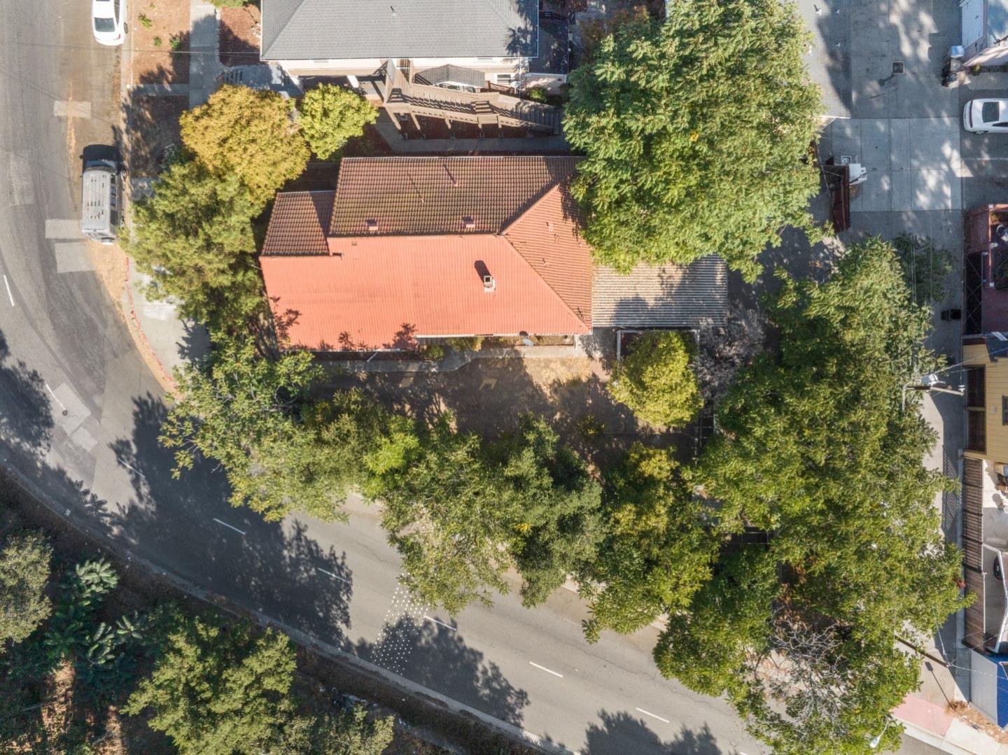 674 South 5th Street San Jose, CA 95112 - Photo 28 of 32 an aerial view of a house with a yard and a large tree