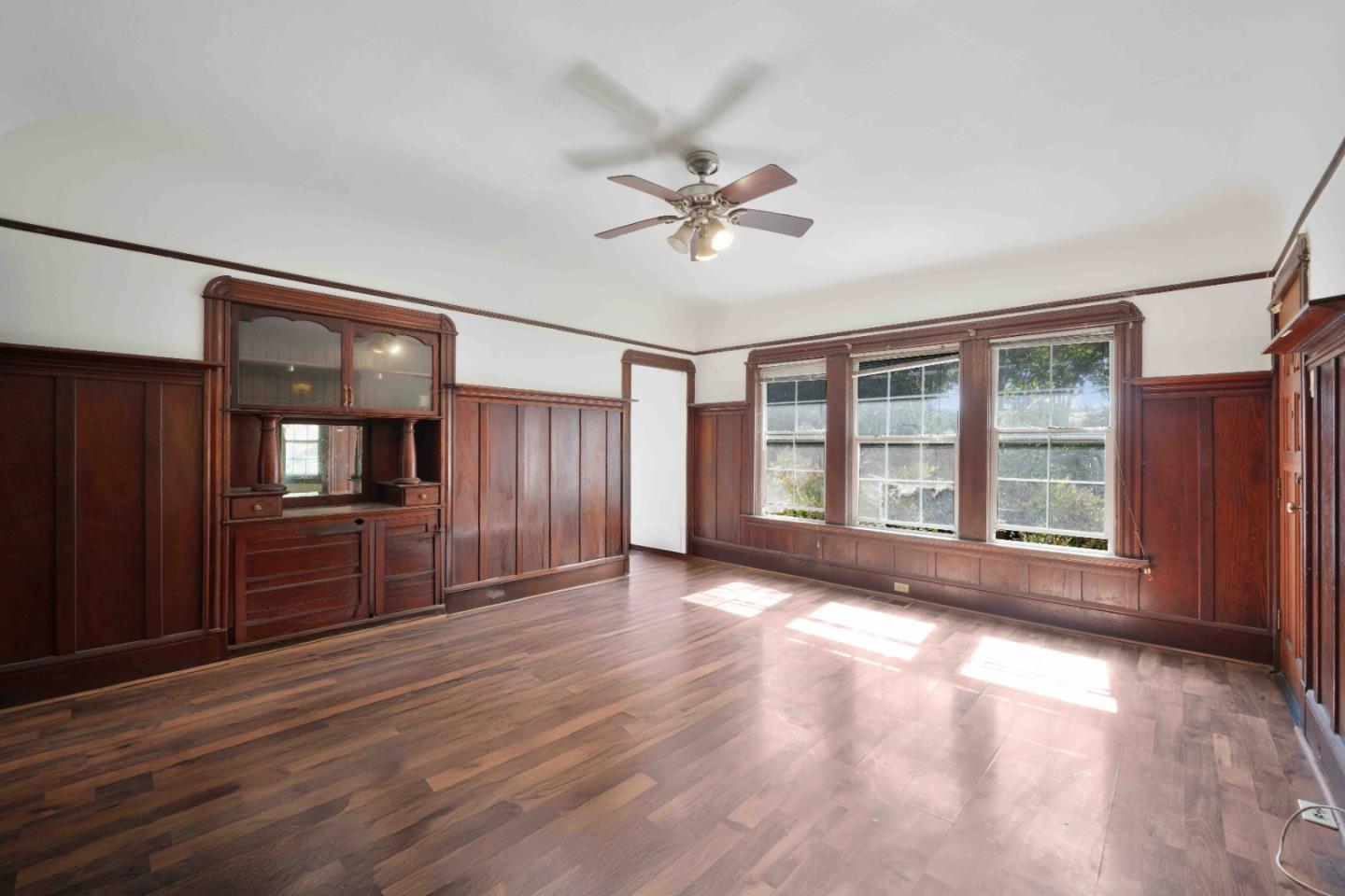 674 South 5th Street San Jose, CA 95112 - Photo 6 of 32 a view of empty room with wooden floor and fan
