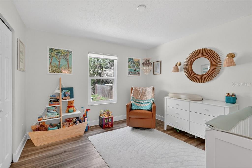 2012 Mango Tree Drive Edgewater, FL 32141 - Photo 12 of 36 a living room with furniture and a window