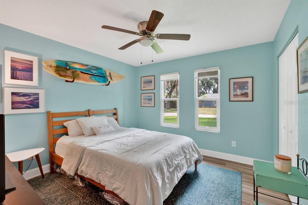 2012 Mango Tree Drive Edgewater, FL 32141 - Photo 15 of 36 a bedroom with a bed and a window