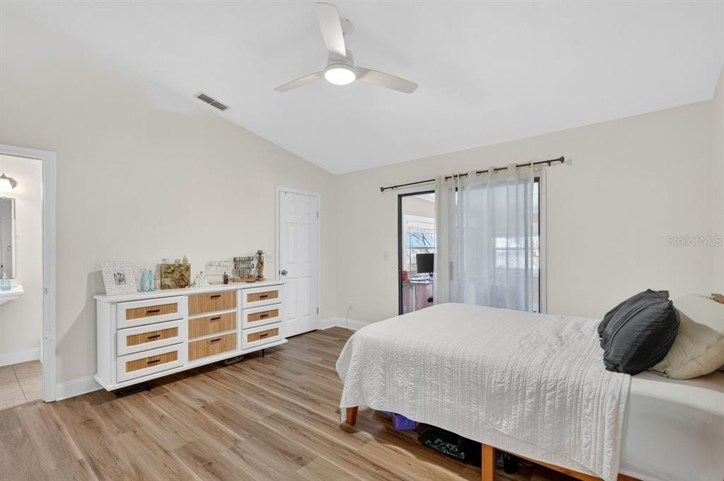 2012 Mango Tree Drive Edgewater, FL 32141 - Photo 24 of 36 a bedroom with a bed and closet