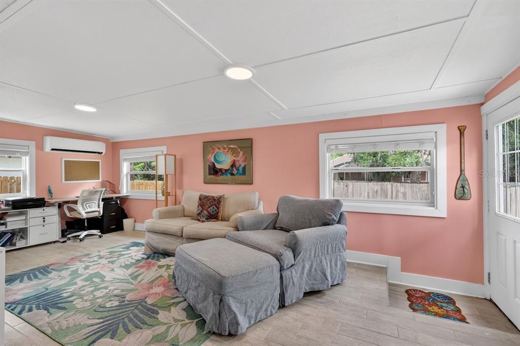 2012 Mango Tree Drive Edgewater, FL 32141 - Photo 27 of 36 a living room with furniture wooden floor and window