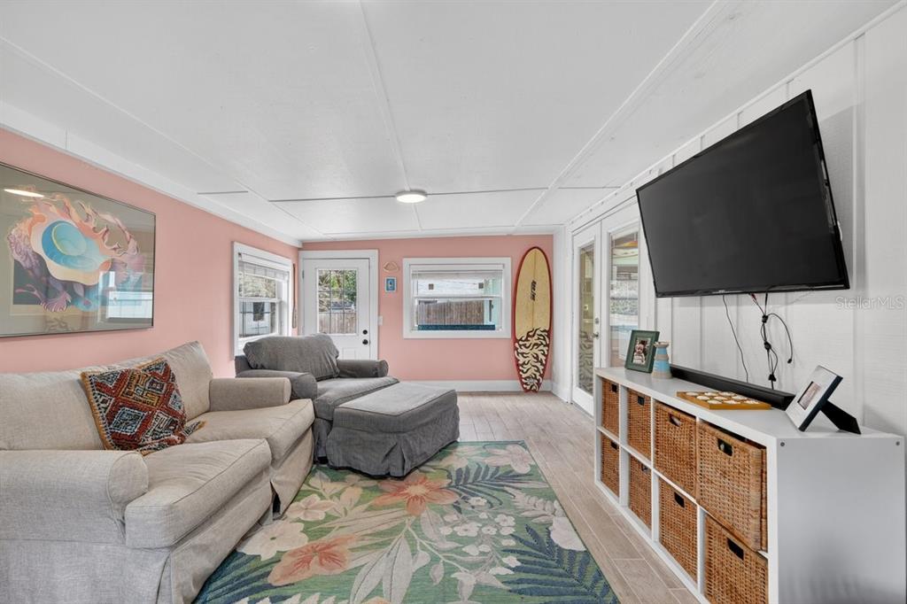 2012 Mango Tree Drive Edgewater, FL 32141 - Photo 28 of 36 a living room with furniture and a flat screen tv