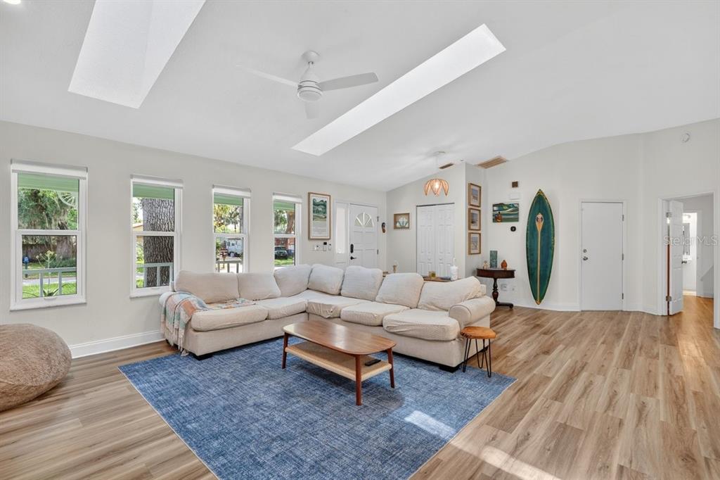 2012 Mango Tree Drive Edgewater, FL 32141 - Photo 10 of 36 a living room with furniture and wooden floor