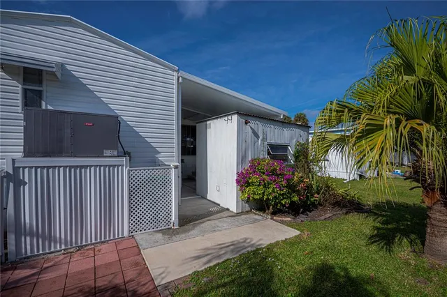 a sign board with a clock on the wall