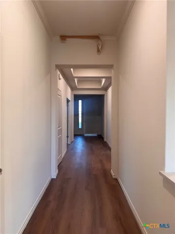 a view of gallery with wooden floor