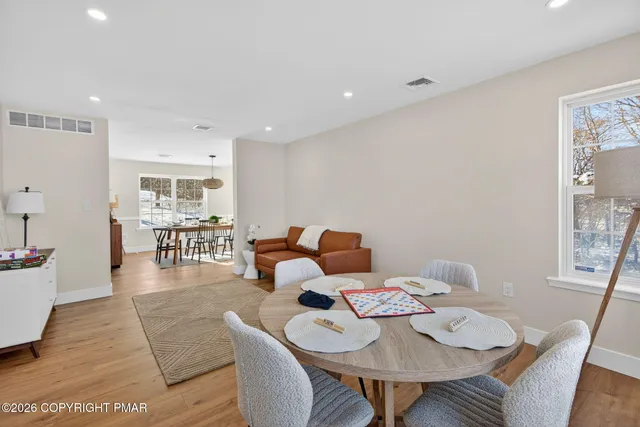 a view of a dining room with furniture