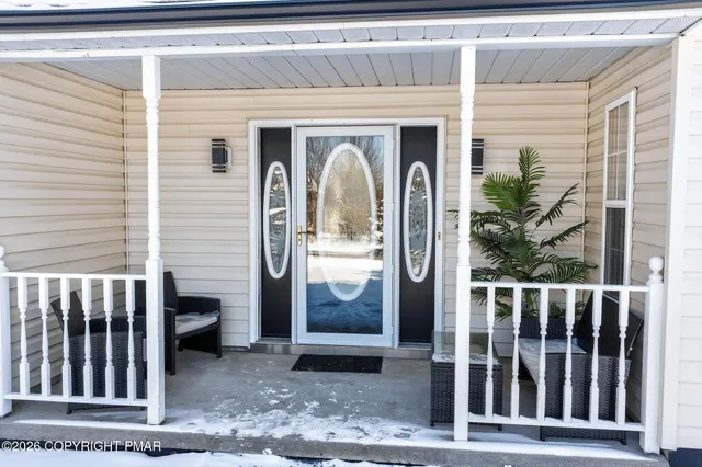 a view of a house with a porch