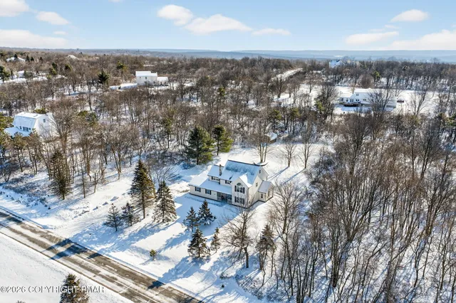 an aerial view of multiple house