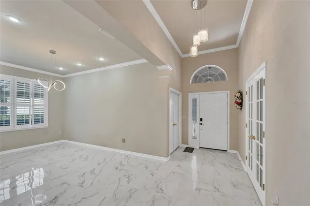 a view of an empty room and window