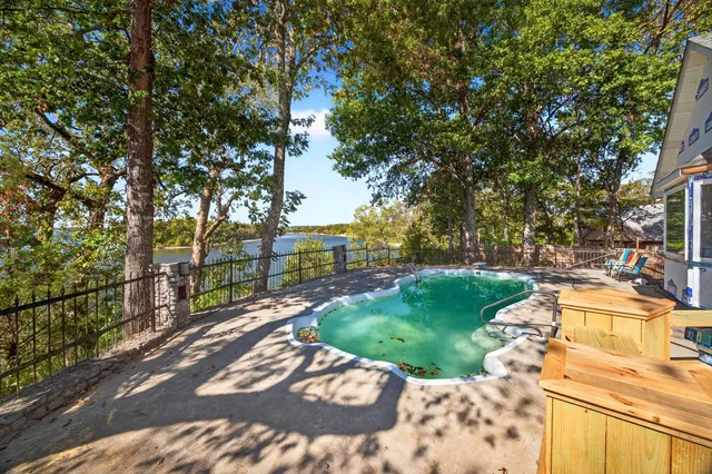 a view of a backyard of the house