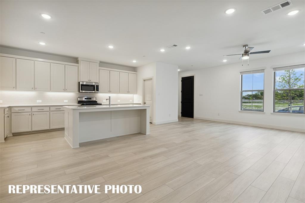 1015 Magdalena Way Midlothian, TX 76065 - Photo 6 of 16 Entertaining is a breeze in this thoughtfully designed home. REPRESENTATIVE PHOTO