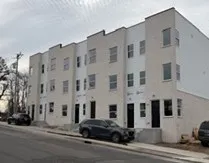 a large building with a street