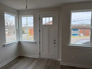 an empty room with windows