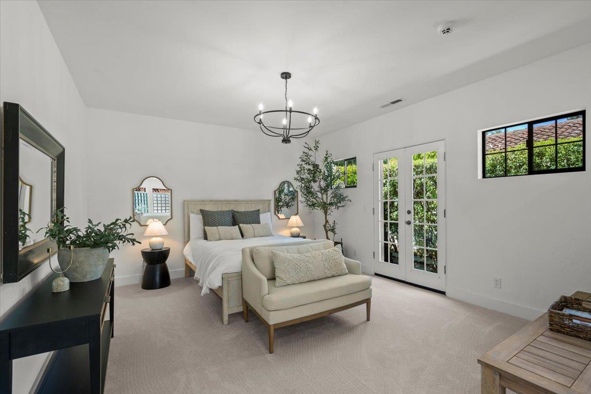 731 5th Street Gilroy, CA 95020 - Photo 15 of 30 a living room with furniture and a chandelier