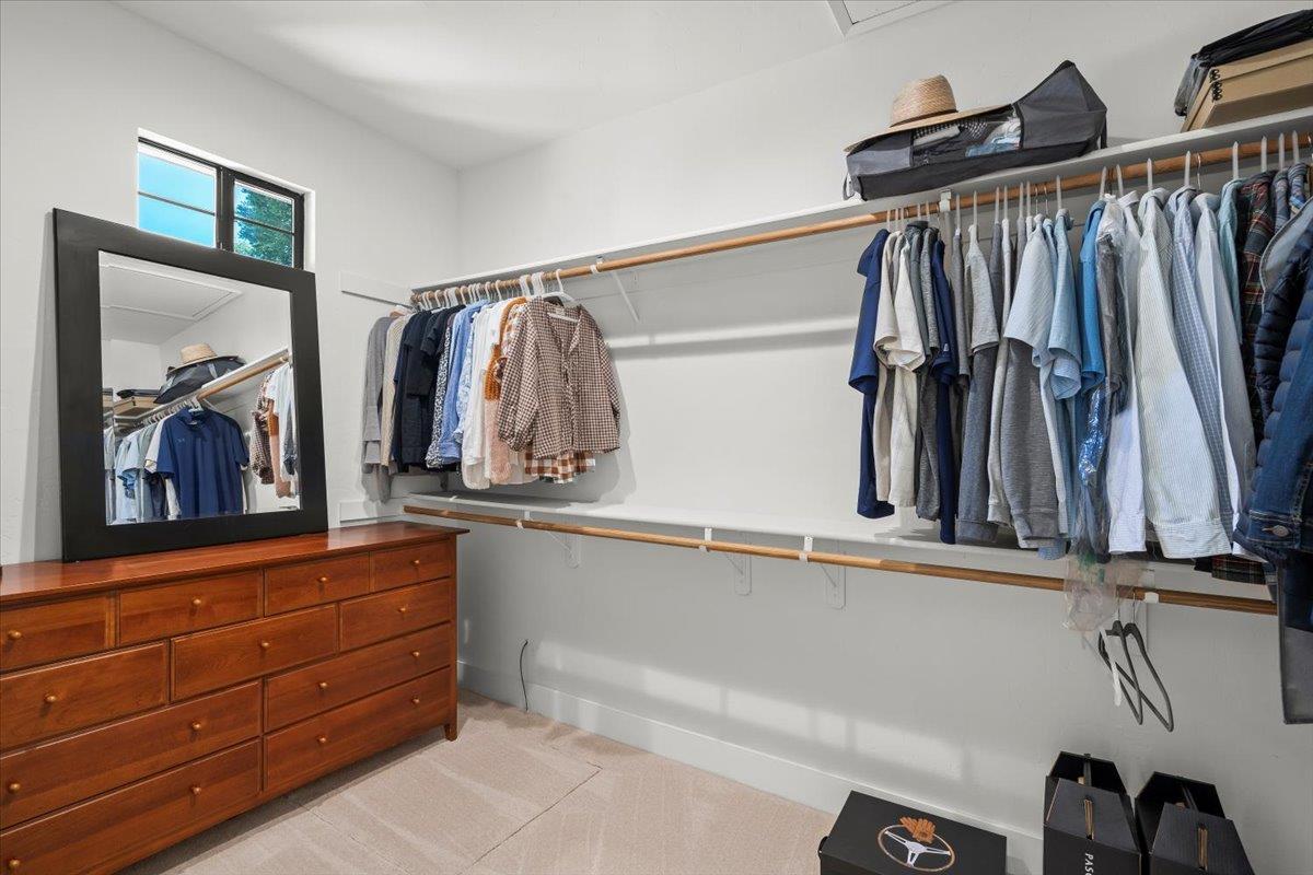 731 5th Street Gilroy, CA 95020 - Photo 21 of 30 a view of walk in closet with clothes and shoes