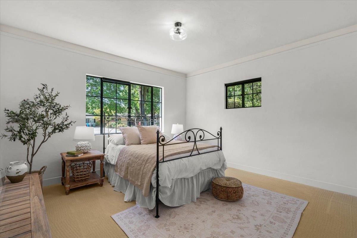 731 5th Street Gilroy, CA 95020 - Photo 22 of 30 a room with furniture and a potted plant