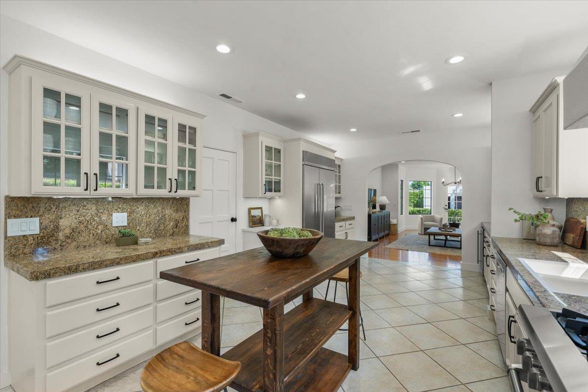 731 5th Street Gilroy, CA 95020 - Photo 8 of 30 a kitchen with a sink and cabinets