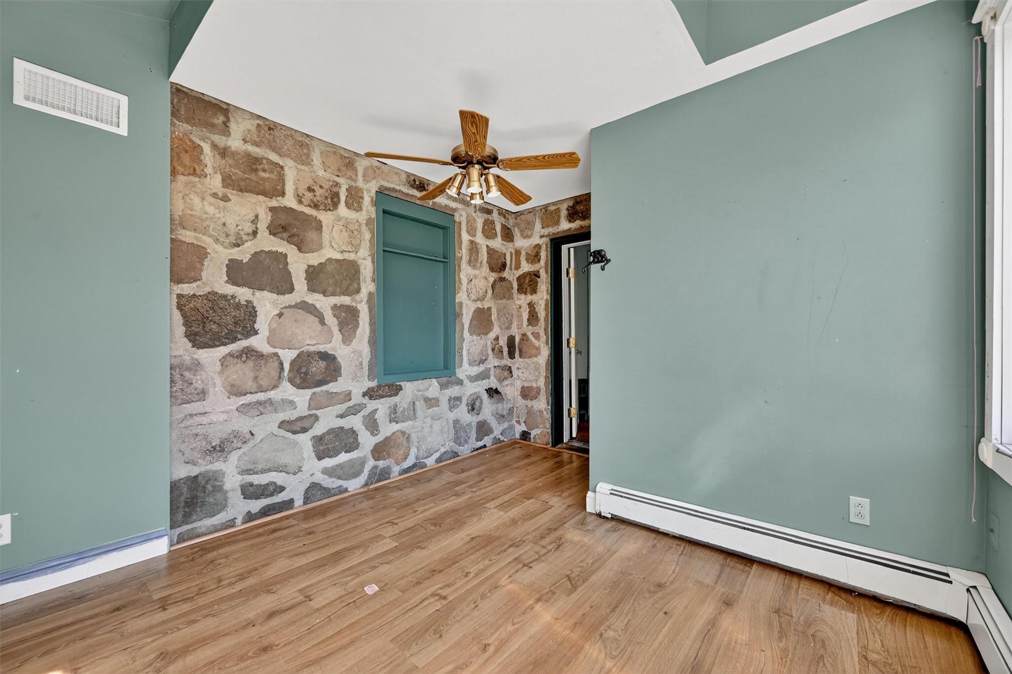 151 Tuthill Road Blooming Grove, NY 10914 - Photo 14 of 49 a view of empty room with wooden floor