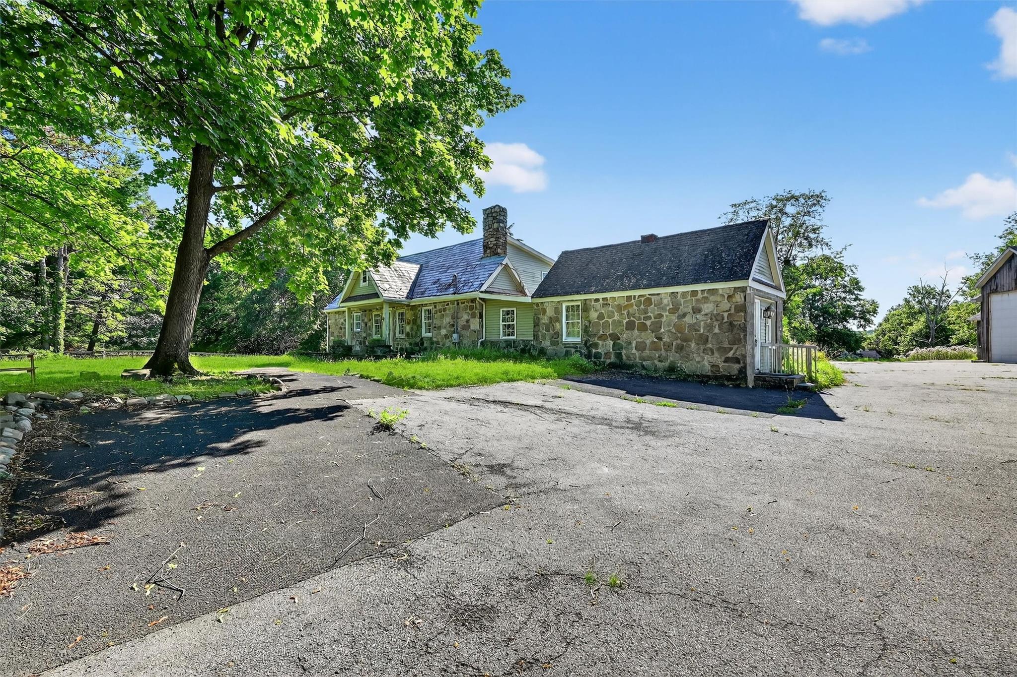 151 Tuthill Road Blooming Grove, NY 10914 - Photo 3 of 49 a view of a street with a house