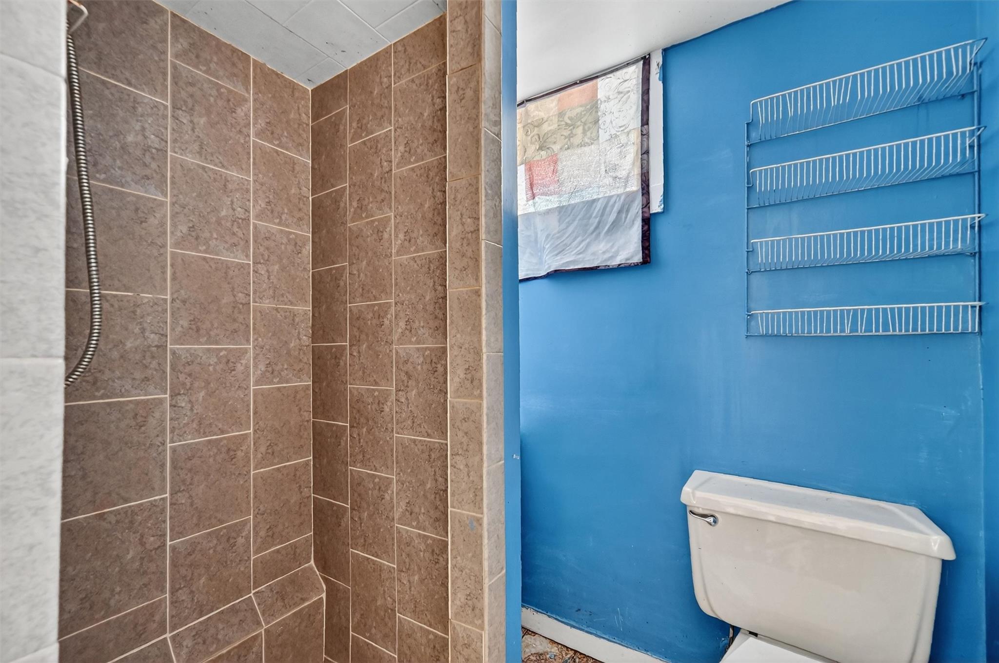 151 Tuthill Road Blooming Grove, NY 10914 - Photo 33 of 49 a bathroom with a toilet and a shower