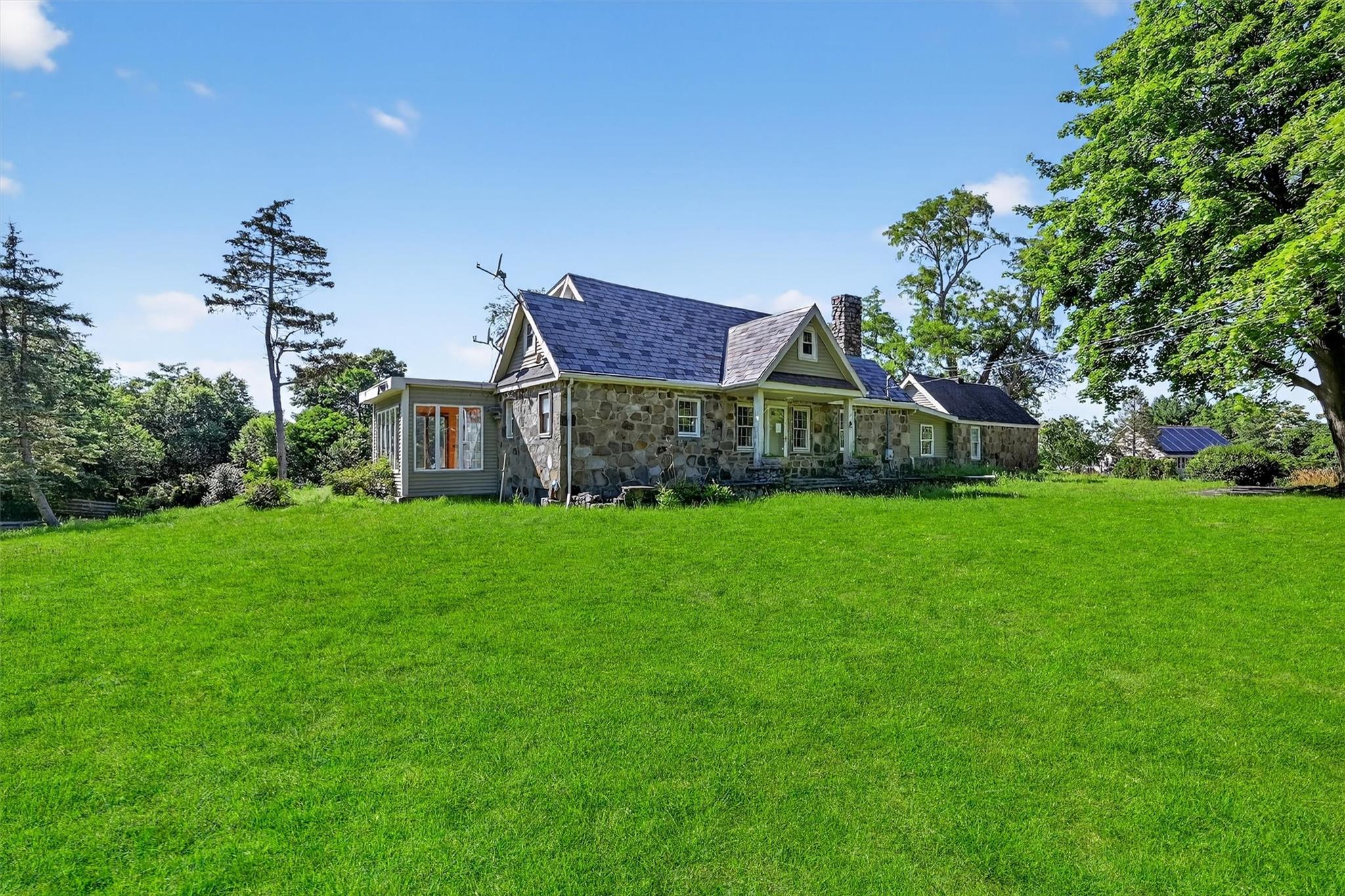 151 Tuthill Road Blooming Grove, NY 10914 - Photo 5 of 49 a view of house with backyard