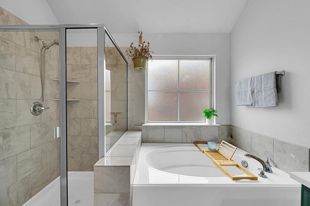 2720 Beutel Road Lorena, TX 76655 - Photo 20 of 37 Bathroom with a stall shower and a bath