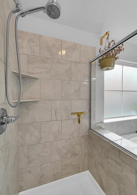 2720 Beutel Road Lorena, TX 76655 - Photo 22 of 37 Bathroom with a tile shower